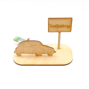 Käfer mit Ortsschild und Geldscheinhalter